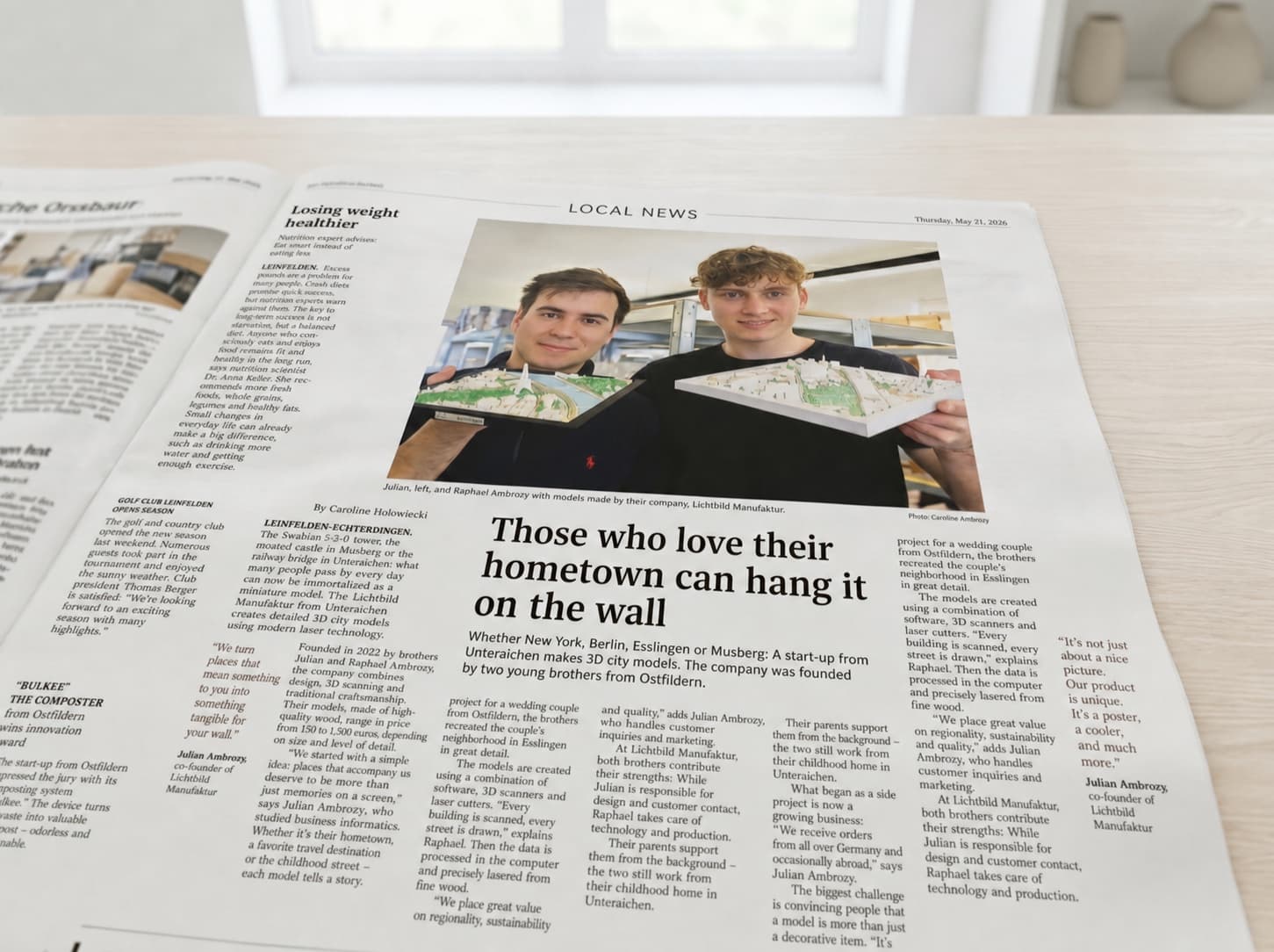 Newspaper article about Lichtbild: Julian and Raphael Ambrozy with their 3D city models